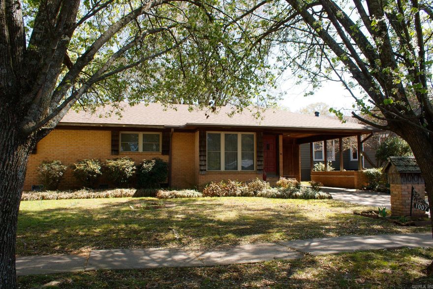 An as-is  great home with motivated seller and ready for your family to add its own personal touch.  Conveniently located in the center of town.  A front and back entrance with  carports. A handicapped ramp is already in place.   A storage room attached and a playhouse that can be converted to a storage building.  Inside is a formal living and dining room, a den with a gas fireplace.  The kitchen is open to an eating area.  3 bedrooms and 2 baths, a separate bonus room, playroom , or another bedroom with skylight.  A separate laundry room with storage.  A craft room, extended closet, or even an office  with privacy. Could be your perfect home.