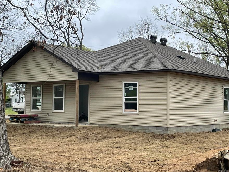 Beautiful New Construction in downtown Cabot! Enter the front door to an Open concept, Split floorplan with Luxury Vinyl Plank throughout! Custom Kitchen Cabinets with Quartz Countertops, Stainless Steel Microwave, Range, Refrigerator and dishwasher! Kitchen/Dining combo. Mud area for Laundry with built in bench nook.   Primary bedroom has private bath with Quartz countertops, nice size bedrooms. Two car carport on backside of home.