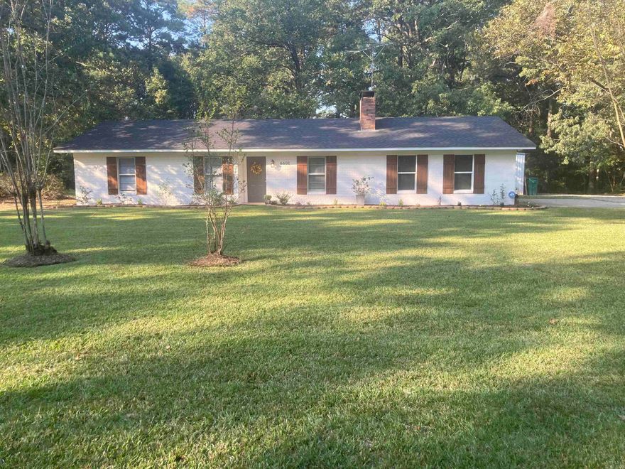 EVERY SURFACE IN THIS HOUSE HAS BEEN REDONE. 3 BEDROOMS, 2 BATHS, BONUS ROOM COULD BE 4TH BEDROOM, NURSERY, OFFICE, COMPUTER ROOM, PLAYROOM FOR KIDS, WHATEVER YOUR NEEDS ARE.  KITCHEN WITH REFRIGERATOR, DISHWASHER, STOVE, MICROWAVE OVERLOOKS LIVING AREA WITH FIREPLACE, SEPARATE DINING ROOM, LAUNDRY ROOM WASHER AND DRYER REMAIN.  ALL NEW PAINT, FLOORING, HTG & A/C NEWER. READY FOR NEW OWNER.