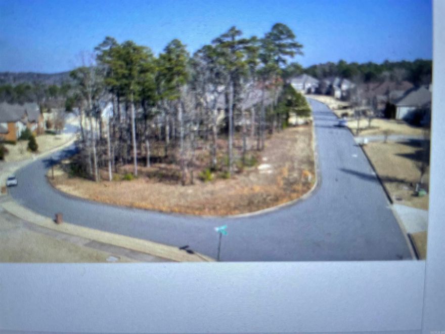 Beautiful large corner lot - over a half an acre in the Sezanne neighborhood of Chenal Valley! Existing survey and subdivision plat online.