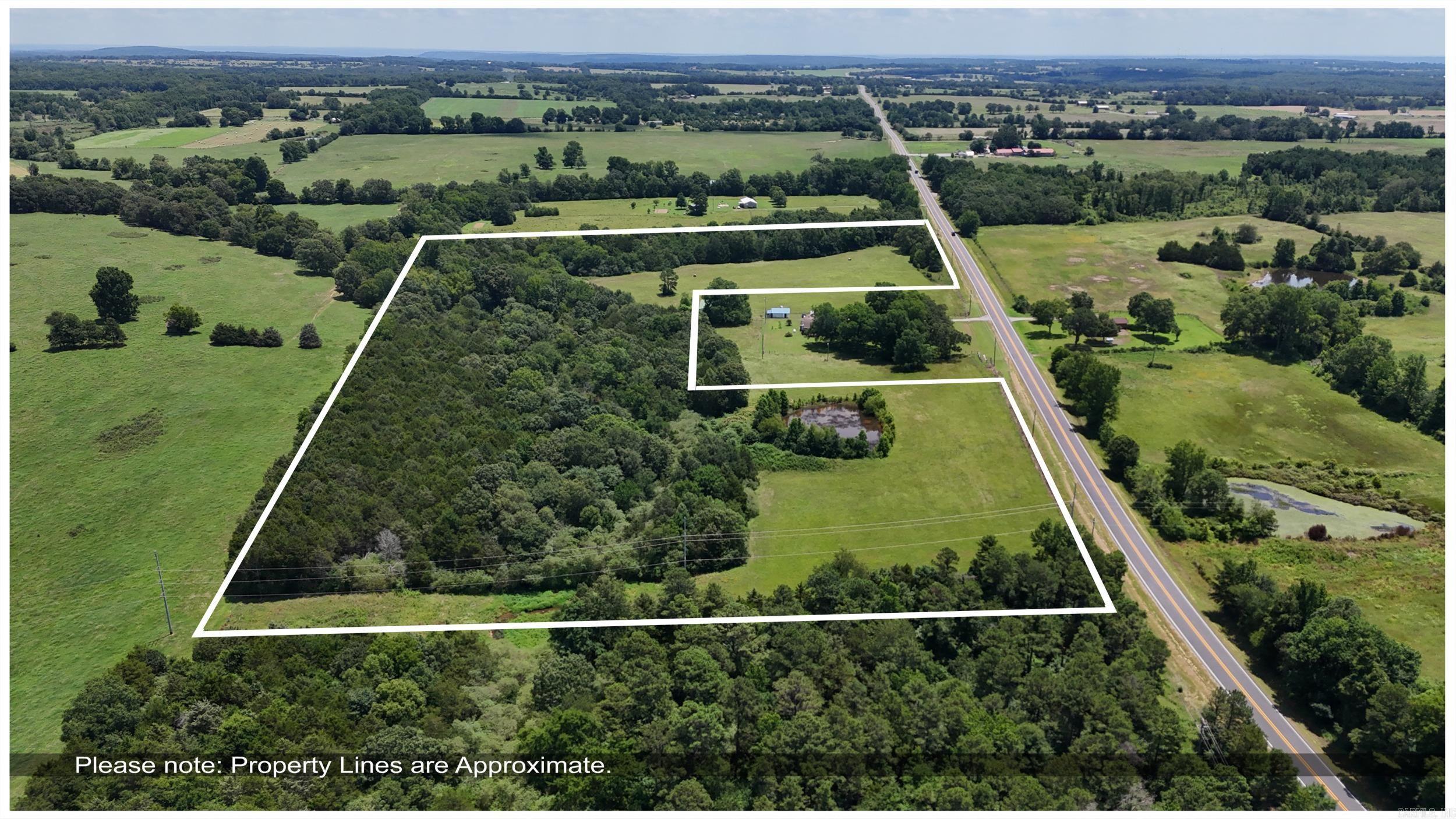 Acreage right off of Hwy 36 W Seller would consider subdividing.