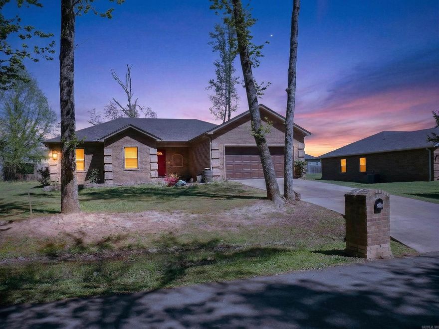 Located along a scenic country drive, this home offers a spacious layout while still being part of an established neighborhood. The open floor plan flows into a comfortable inviting living area with a wood-paneled ceiling.  The kitchen features granite countertops, and rooms offer new Tempur-Pedic carpet for added comfort. The primary bedroom includes a walk-in closet, while the primary bath features a double vanity and walk-in shower.  Step outside to a large, fenced yard and mature garden with space to enjoy the outdoors. Conveniently located with easy access to Cabot, shopping, dining, and major roadways.