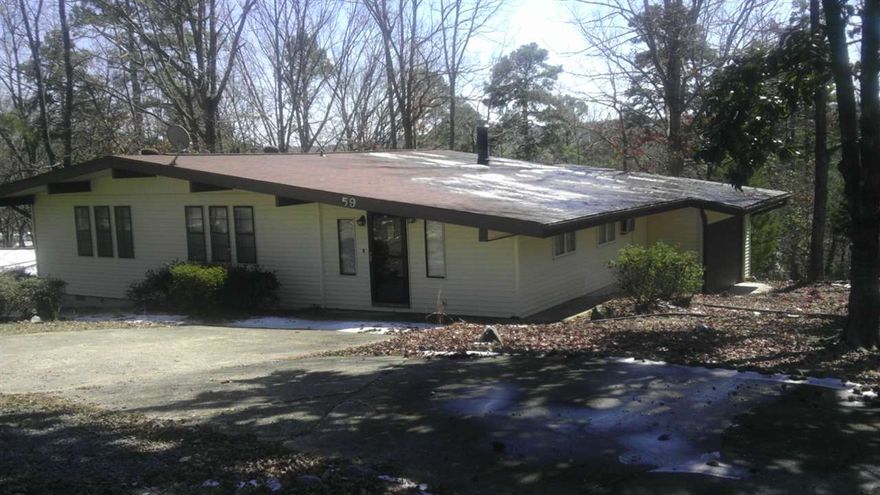 Nice starter home or investment property. The kitchen has been totally remodeled and there new patio doors and a wood stove in the great room. Big corner lot with a circle drive plus a two car garage on the side. You need to check it out.