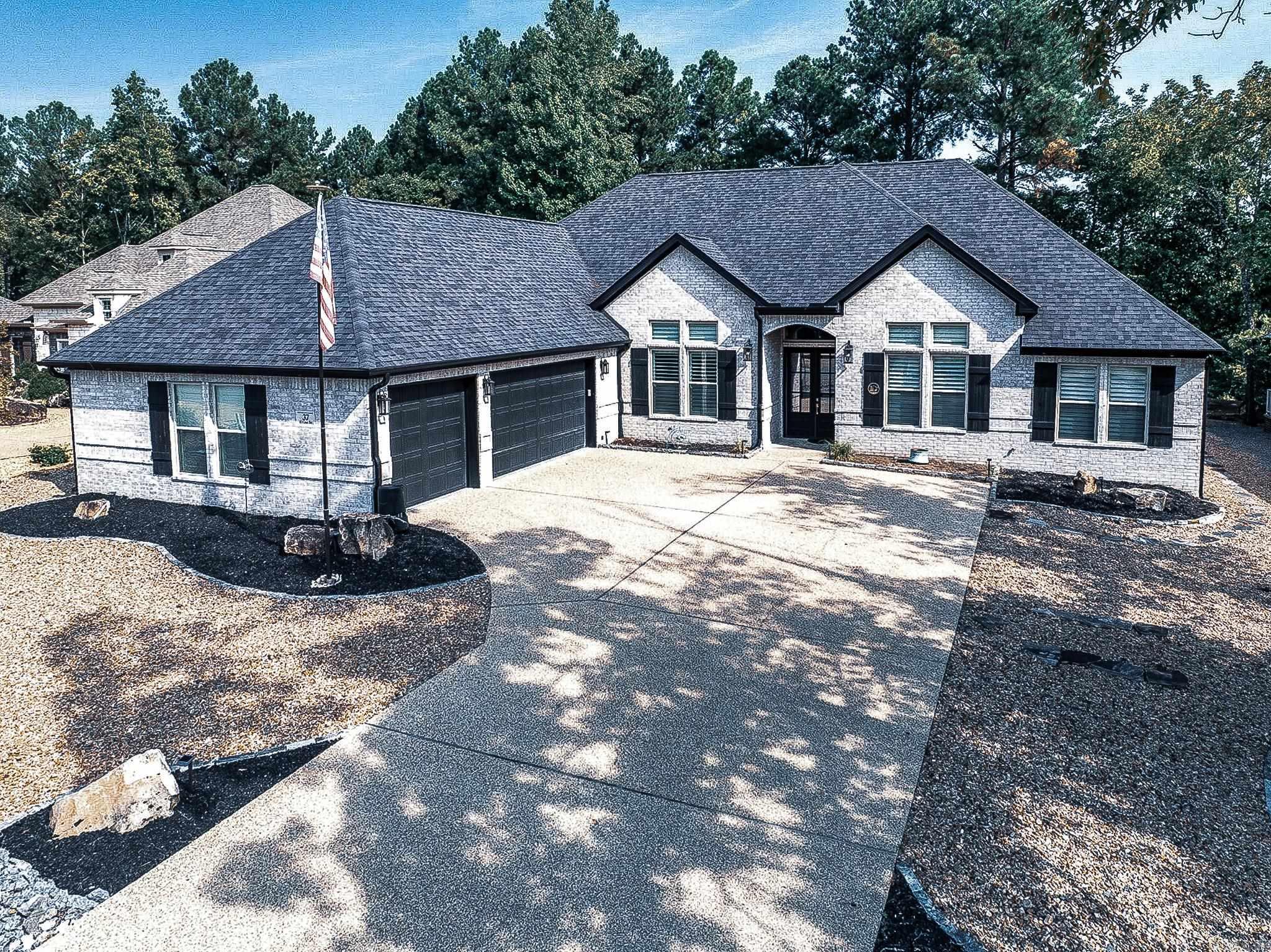 AGENTS SEE REMARKS! Does not look lived in on a level lot from street to fairway! This one level beauty has a three car garage with epoxy flooring, split bedrooms plus office and huge gourmet kitchen with walk-in pantry, quartz counters, and plantation shutters. Covered back yard patio for outdoor entertaining with privacy panels, turf grass and a wrought iron fence for Fido. Did I mention the 14' ceilings, 11" baseboards and gutter guards?? You may also want to take advantage of the 2.5% assumable loan for VA eligible buyers. (Call for details.) All the bells and whistles you would expect to find in a luxury golf course home on Granada!