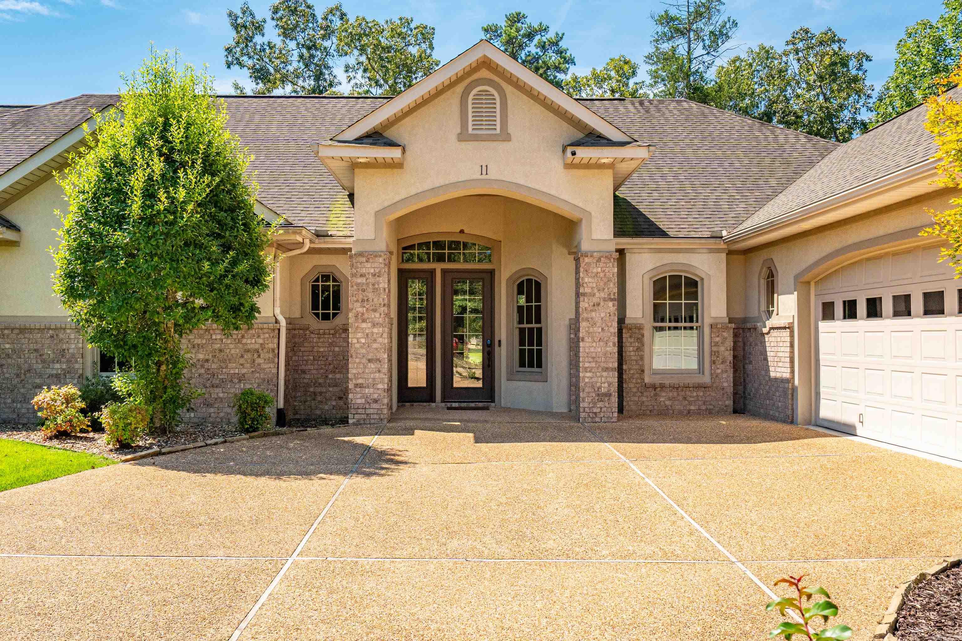 Enjoy easy one-level living with stunning views of Isabella Golf Course in this beautifully designed townhouse featuring high volume ceilings and a spacious layout. The home offers both a Great Room and a cozy Family Room with a gas fireplace, perfect for relaxing or entertaining. The efficient kitchen boasts granite countertops, a center island, abundant cabinet space, and flows seamlessly into both an eat-in area and the great room. A large, private primary suite is thoughtfully separated from guest bedrooms for added tranquility. Step outside to a covered patio ideal for morning coffee or evening sunsets. You will appreciate the convenience of a side-load two-car garage that enhances curb appeal. Yard maintenance is included in the Townhouse fees, leaving you more time to enjoy your life. Approx. 2377 sq. ft of heated and cooled living space. Priced at $439,900
