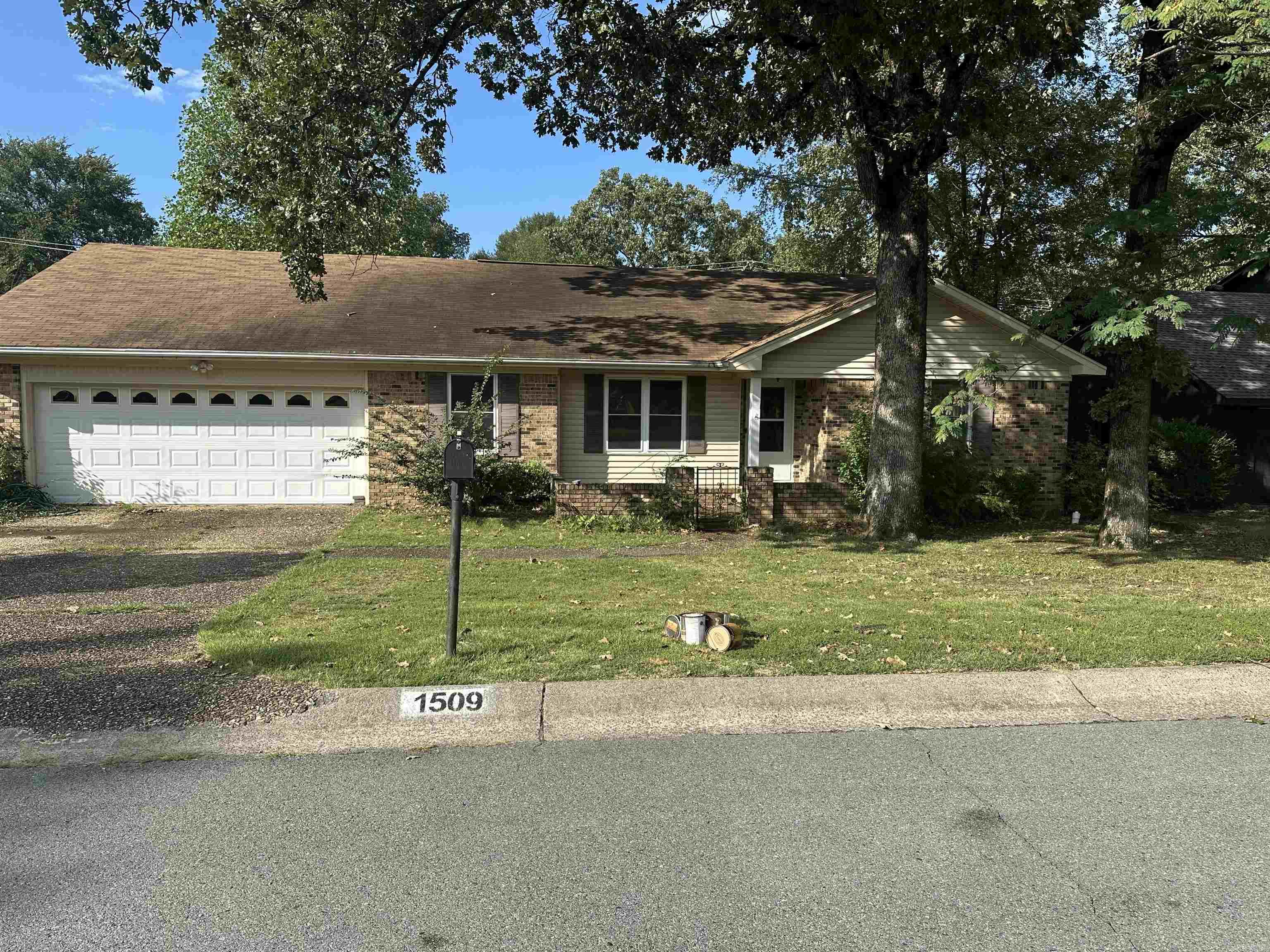 Long time owner of this one level house did do required repairs like replaced roof new hot water tank 2024 new heat /ac but rest of the house is original condition and needs to be updated.Split bedroom plan formal dining room plus large eat in kitchen nice size kitchen with lots of cabinets nice size bedrooms nice size den with wood burning fireplace.All brick house with private backyard backs up to wooded area big deck on back .SELLER is not wanting to do many repairs as why it priced like it is .