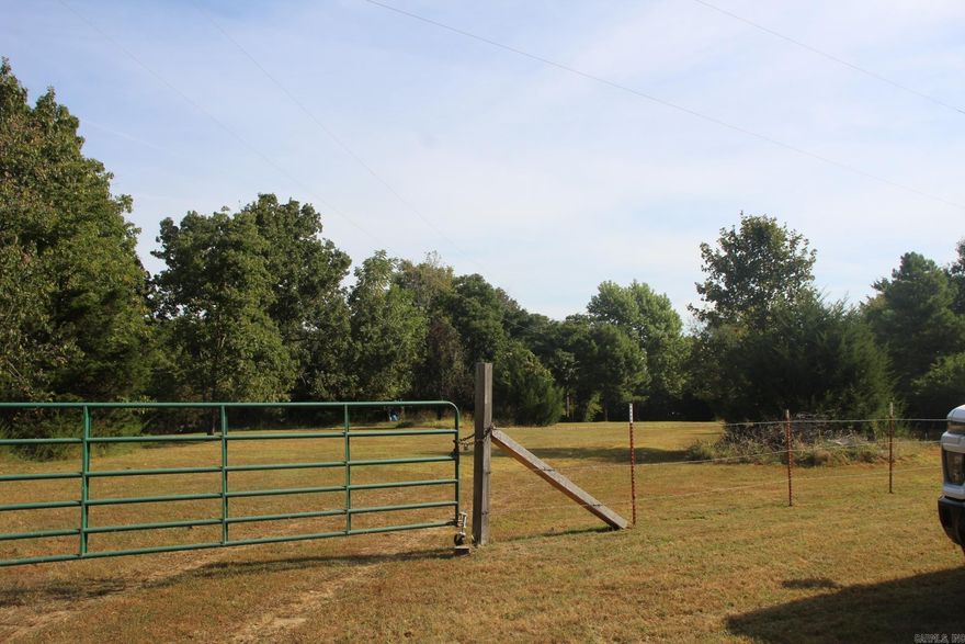 Looking for your slice of peaceful country life? This 1.83 m/l-acre parcel offers level ground, perfect for building or parking your RV.  Well and septic already in place.  Located just a short drive from Bull Shoals Lake, enjoy easy access to boating, fishing and outdoor recreation.  Rural setting with plenty of space to stretch out and enjoy the natural beauty of the Ozarks.