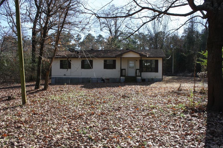 3 BD, 2 baths, approx 1200 Sq. Ft. of living space situated on approx. 2.07 Acres.