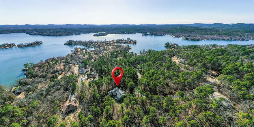 Fabulous Location in the Lake Balboa neighborhood with the added privacy of vacant lots on each side and across! This 3 bed/2.5 bath updated & immaculately maintained home has 2 large living areas, an oversized 3 car garage, a separate breakfast area, & large laundry/mudroom. The spacious primary bedroom & ensuite with walk in closet has a garden tub with the most serene view. Savor a cup of coffee while nature watching on the front porch or covered deck. You will appreciate extra storage in the fully encapsulated basement. The no maintenance landscaping affords you downtime for the wonderful amenities Hot Springs Village has to offer like championship golf courses, state of the art tennis & pickleball facilities, hiking trails, a gorgeous sand beach, indoor fitness center & pool, venues for concerts & more!  Updates include: newly painted exterior, 2015 replaced one hot water heater, 2016 installed energy efficient barrier in attic, 2020 fully encapsulated the unfinished basement, 2021 upgraded kitchen and added granite countertops, 2022 the other hot water heater was replaced, 2023 NEW ROOF!! *Hot Springs Village has a one-time $1500 buy-in fee for new owners due at closing.