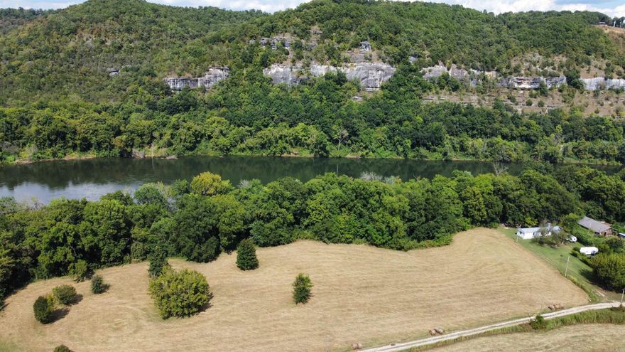 2+ acres on the Beautiful White River, you have a view of mountains, bluffs and the river.  If you like fishing or just sitting and relaxing, watching the river go by, take a look at this property.