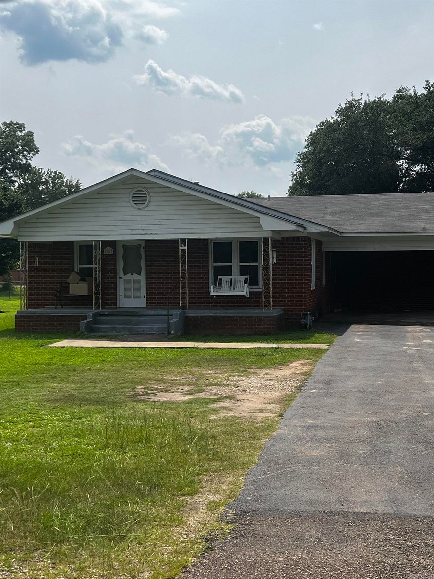 Brick home located in the Heart of Murfreesboro, minutes from the Crater of Diamond State Park and beautiful Lake Greeson.  This home offers over 1,490 sq ft of living space, 3 bedrooms and 2 full baths.  Double carport, screened in porch, chain link fenced yard and large 30x60 shop building situated on approx .49 of a acre. Contact our office for more details or to schedule a viewing.