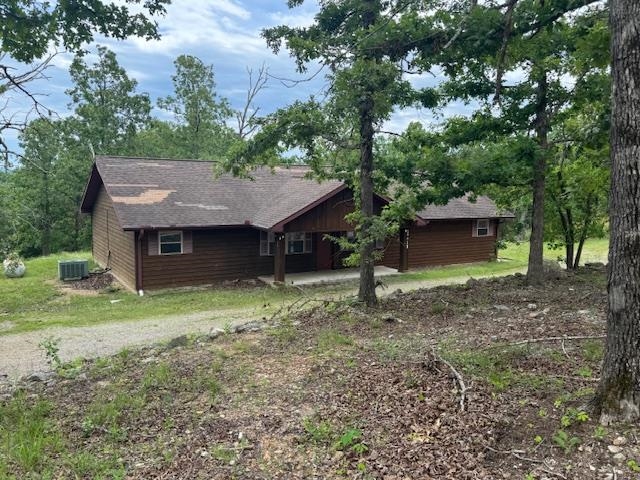 Hot Diggity Dog, here is the perfect house for you! This home is sitting on 9.84 acres m/l and is just waiting for you to make it your own. Some of the many wonderful features include a poured concrete pad for you to build your 30x40 shop building. Spacious rooms, covered back deck and a circle drive! All of that and minutes from Norfork Lake Access. Buyer to verify all information about property.
