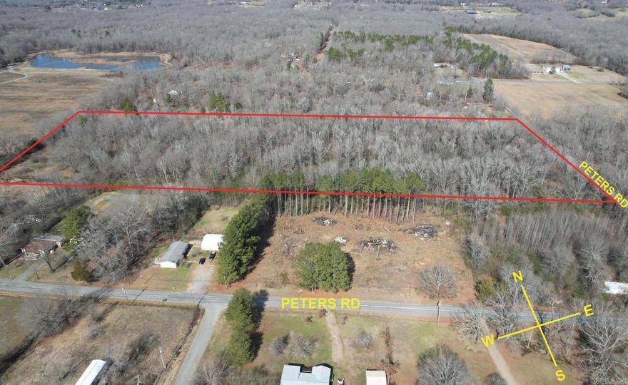 MOBILES WELCOME - 10.54 Unrestricted Acres! In a great location, on the edge of Cabot school district and Jacksonville North school district, and only 10 minutes from the Air Force Base. Property is wooded but seller can clear land for additional charge / the right offer. Property has a running creek that has a tributary. Front of property is in a flood zone but features excellent drainage from all directions. More pictures soon!
