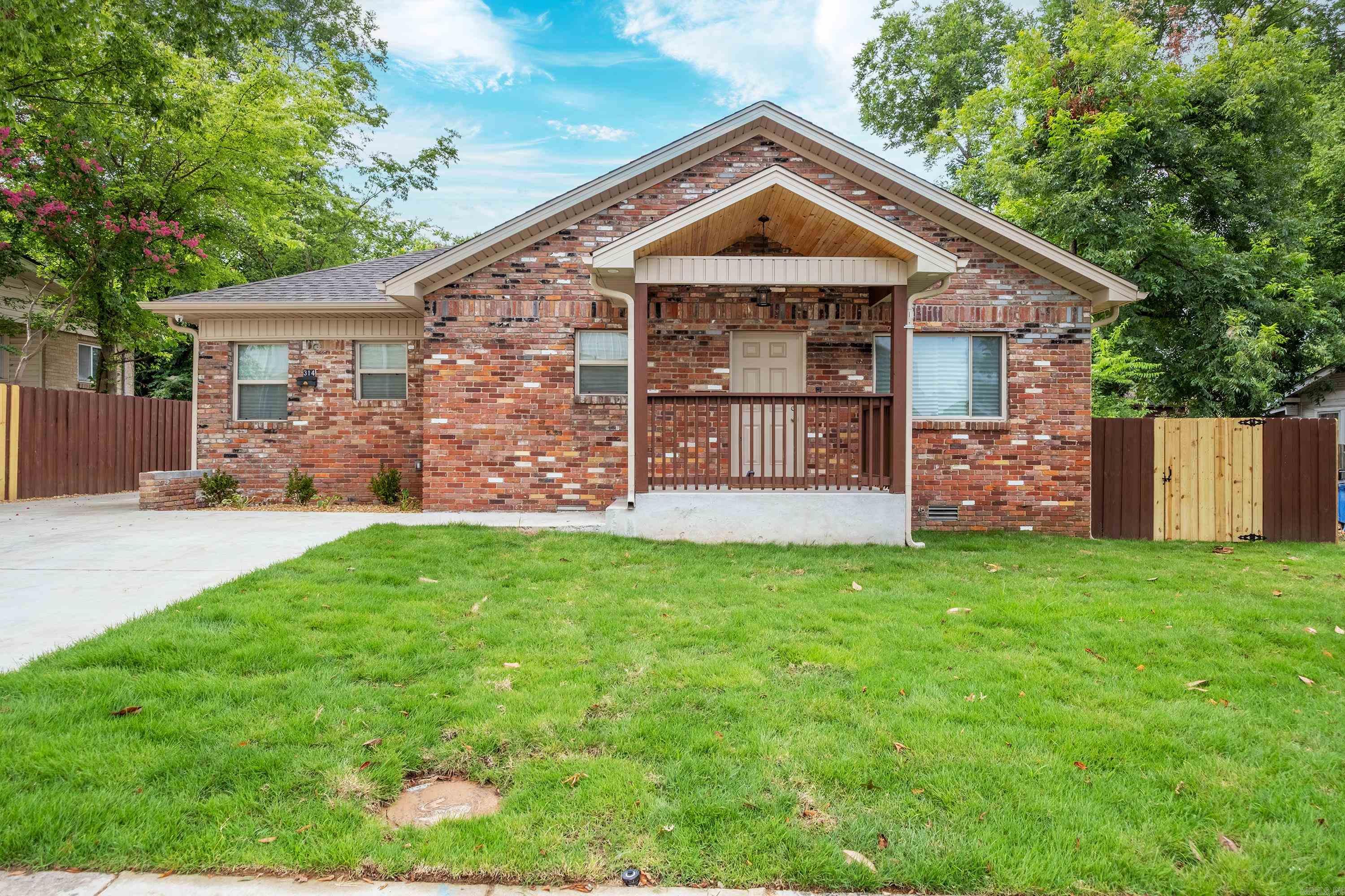 Completely remodeled home in prime location. Modern kitchen with quartz counters, pretty white cabinets and stainless appliances. Nice primary suite: bath has soaker tub and separate shower. 2nd bedroom has it's own bath. Cozy dining area with fireplace. Large family room that's great for gatherings or it could be a 3rd bedroom. Home sits directly across from North Little Rock High School so kids can walk to school. Great location that's convenient to public transportation, interstate, shopping and dining. Don't miss this opportunity!