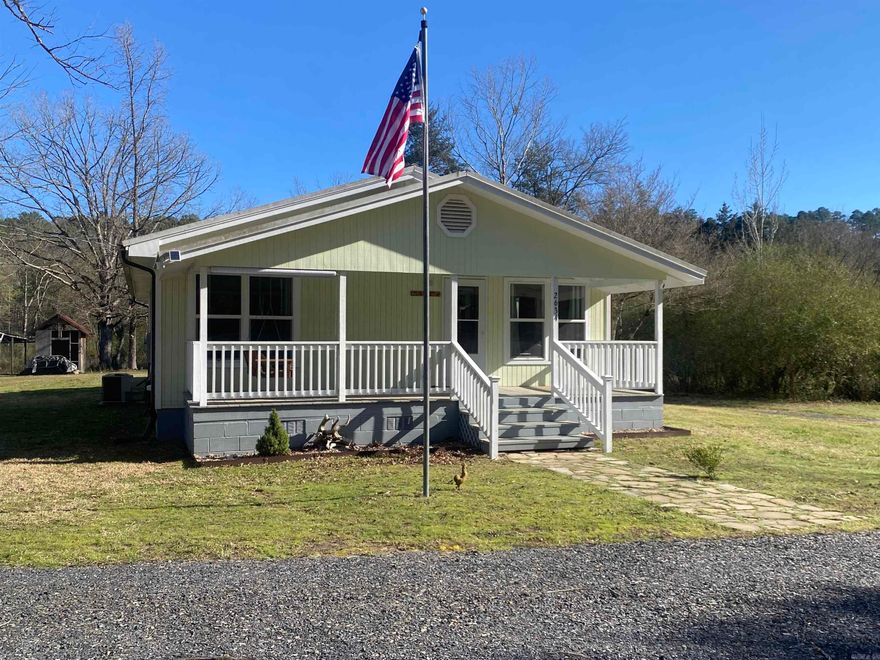 Enjoy your time close to Lake Ouachita near Highway 27 Fishing Village!  This 5 acre parcel m/l features a beautiful 1232 square foot remodeled "farmhouse" with 3 bedrooms and 2 baths. There is a creek running at the back of the property and lots of space to raise chickens for your farm fresh eggs. The hardwood floors in this house are original and have been refinished. The open kitchen has new appliances and a breakfast bar. Front and back porches are available for your enjoyment.  New gravel driveway going right into the carport. This house was a total remodel finished in 2022.  You are going to love this spot!  Don't miss out on this fantastic place!  $209,000.00