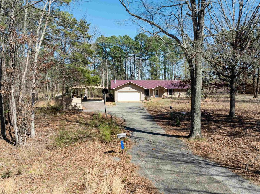 Furnished 4 bedroom, 2.5 bath home situated at the end of a quiet street on 1.26 acres. Features include a 2 car garage, back deck, and new roof installed February 2025. Private setting with plenty of room to enjoy indoor and outdoor living.