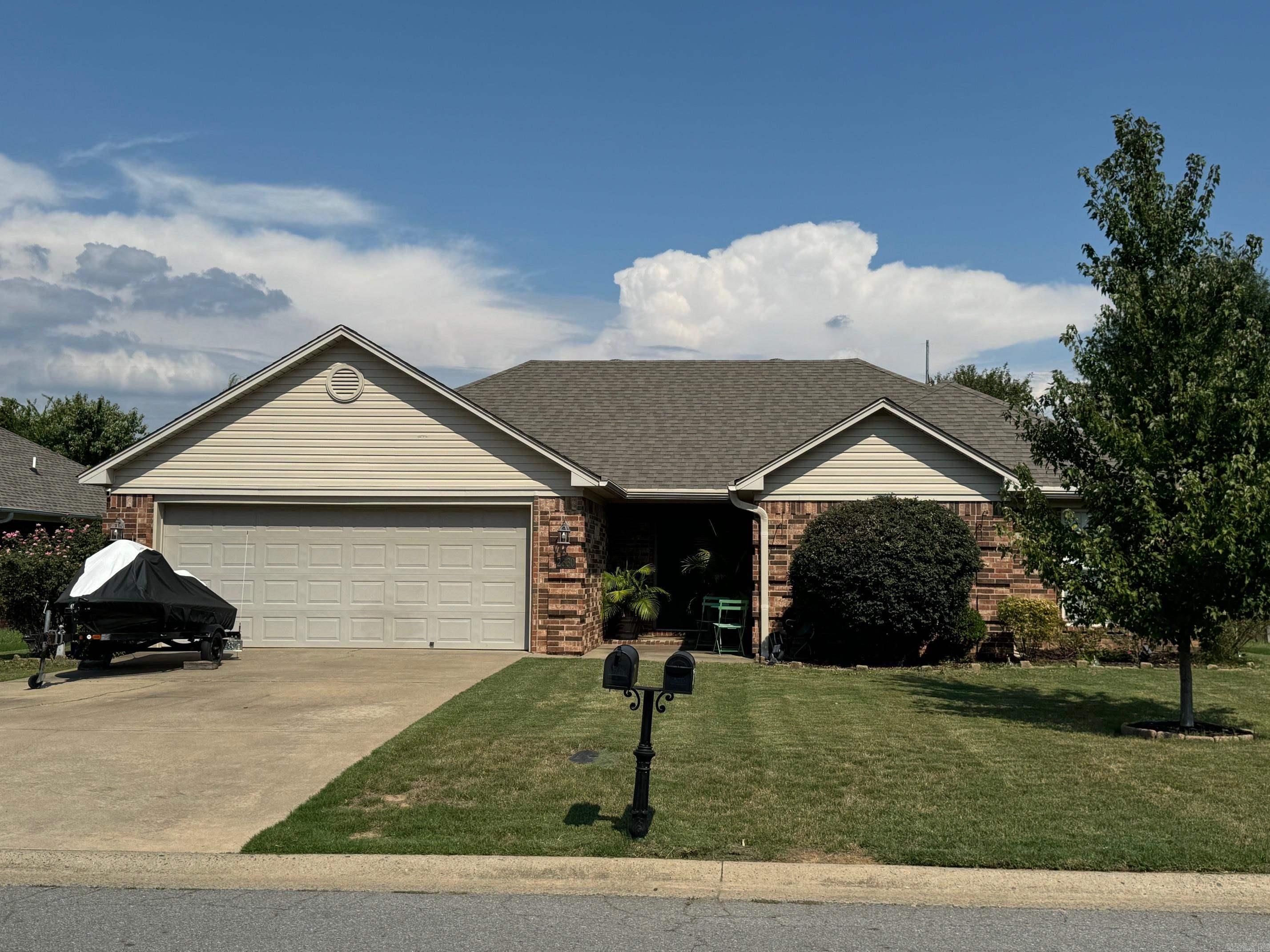 Check out this Three Bedroom Two Bath Home with Two Car Garage! Home has a split floorplan with Laminate Floors Throughout and a gas log fireplace in the living room. Large fenced backyard with covered back patio. Home is centrally located close to everything. Roof replaced 2016, new stainless steel appliances 2022, water heater replaced 2019.