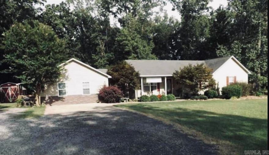 Discover the hidden gem that's waiting for your personal touch! This charming 4-bedroom, 3-bathroom home offers 2,278 square feet of endless possibilities for the savvy buyer who isn't afraid to roll up their sleeves. While this property might need a little tender loving care, it's brimming with potential that could transform it into your dream home. The real showstopper here is the tranquil stocked pond gracing the back of the property.It's like having your own private retreat right in your backyard.  For those who take safety seriously, you'll appreciate the storm shelter conveniently located in one of the bonus rooms.  Call for a private showing today!