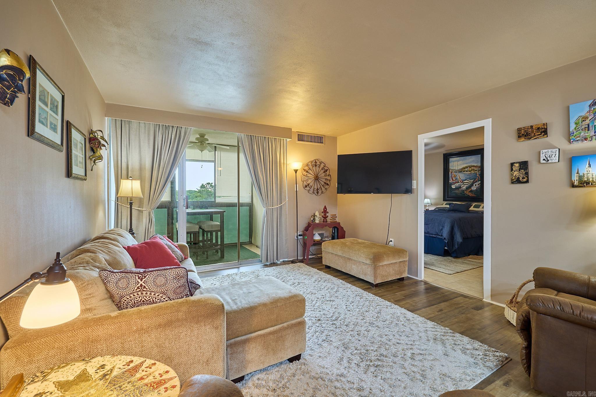 Beautiful views of Lake Hamilton coupled with lovely amenities inside and out make this the lakeside escape you have been looking for!