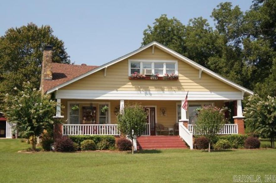 WOW!  This is an older home but the Seller have fixed it up and updated this homes and is very well done.  Check out the details throughout this home with hardwood floors, wood ceilings and more.  There is an upstairs with another living area, 3rd bedroom and a bonus room.  New roof 2012.  Take a look at these pictures and you will want to see this home.  There is a detached one car garage, detached covered patio, storage, fire pit, waterfall and a storm cellar.  It is worth taking a look at!