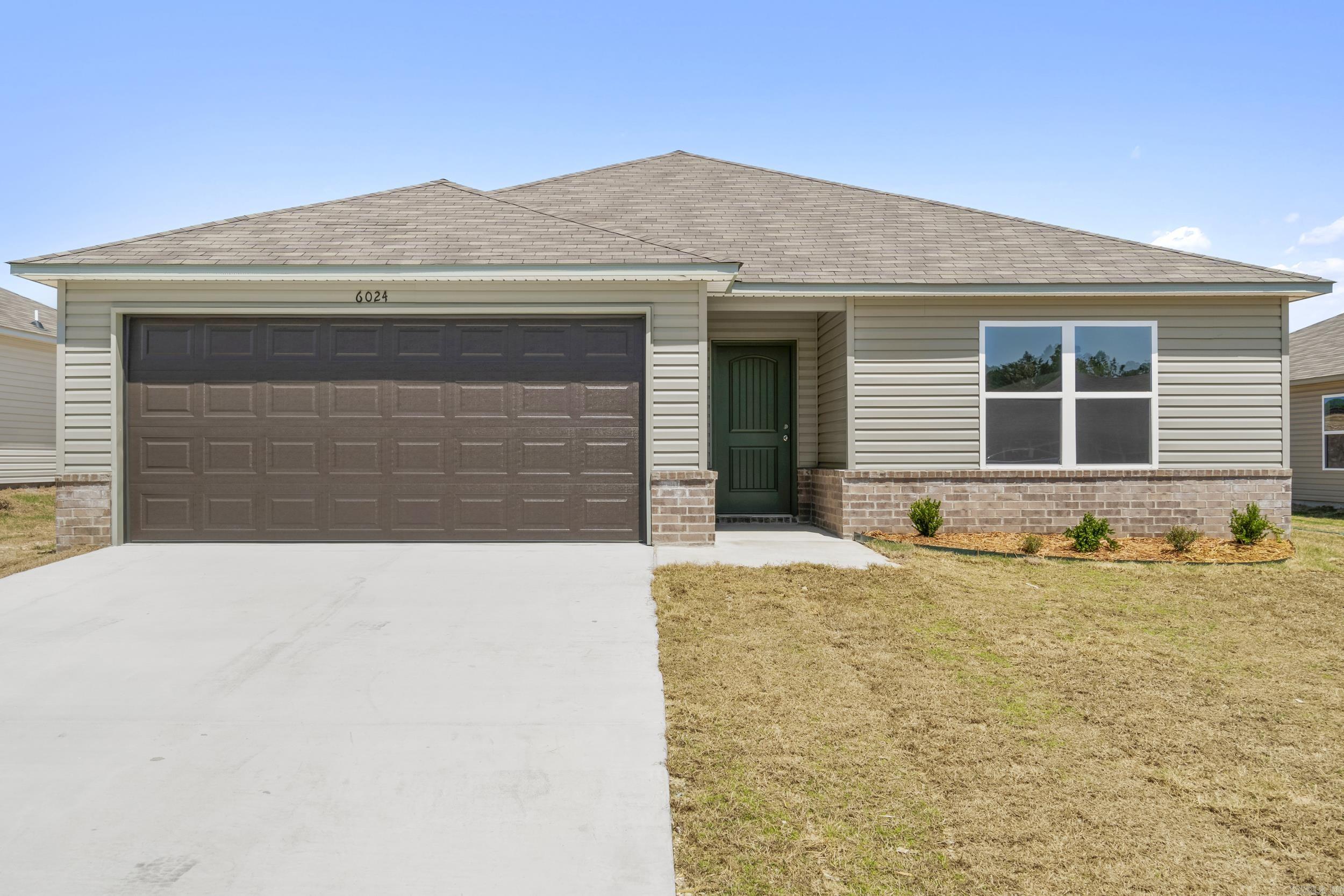 The Foster II plan is a charming and inviting home design that exudes curb appeal with its front porch and well-maintained front yard landscaping, creating an inviting atmosphere right from the curb. This open-concept home provides a spacious living experience with 3 bedrooms and 2 bathrooms, ensuring ample room for comfort and privacy. The kitchen is a standout feature of the home, boasting a complete set of energy-efficient appliances that cater to modern needs and preferences. Whether you're cooking daily meals or hosting gatherings, the Foster II plan offers functionality and style. Explore more about this delightful home today to see how it can meet your lifestyle preferences and needs! **SEE SHOWING REMARKS & AGENT REMARKS FOR IMPORTANT INFORMATION**