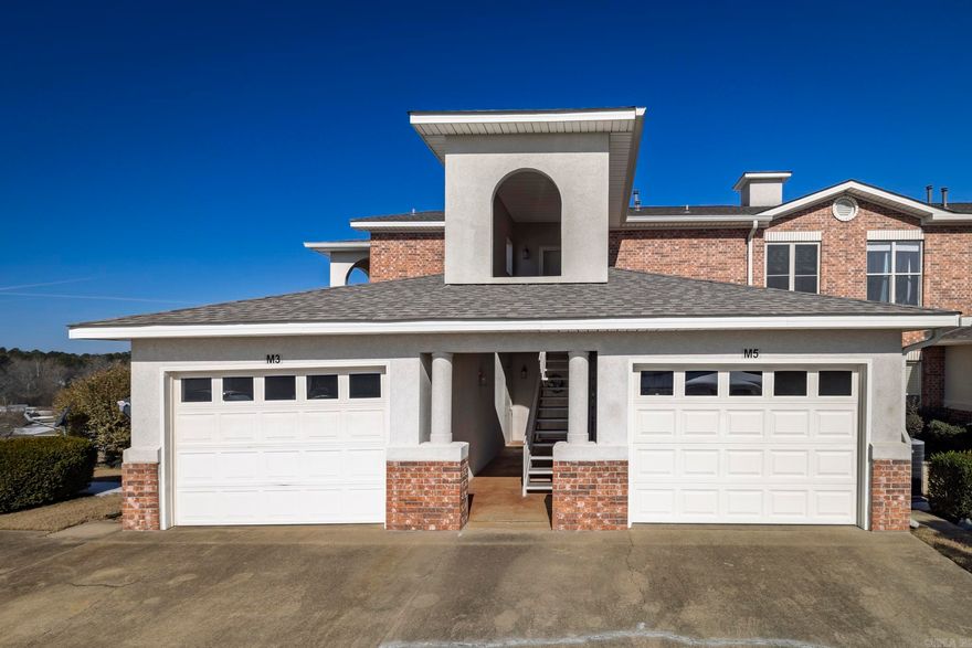 Welcome to Millennium Bay gated community. This home has been nicely updated  with new flooring, new windows, new roof, fresh paint thru out, avoid the stairs with convenient chair lift. Spacious living dining/kitchen combination, gas fireplace insert and remote control, porches with spectacular view of Lake Hamilton and mountains. Millennium Bay features swimming pool,  & access to Lake.