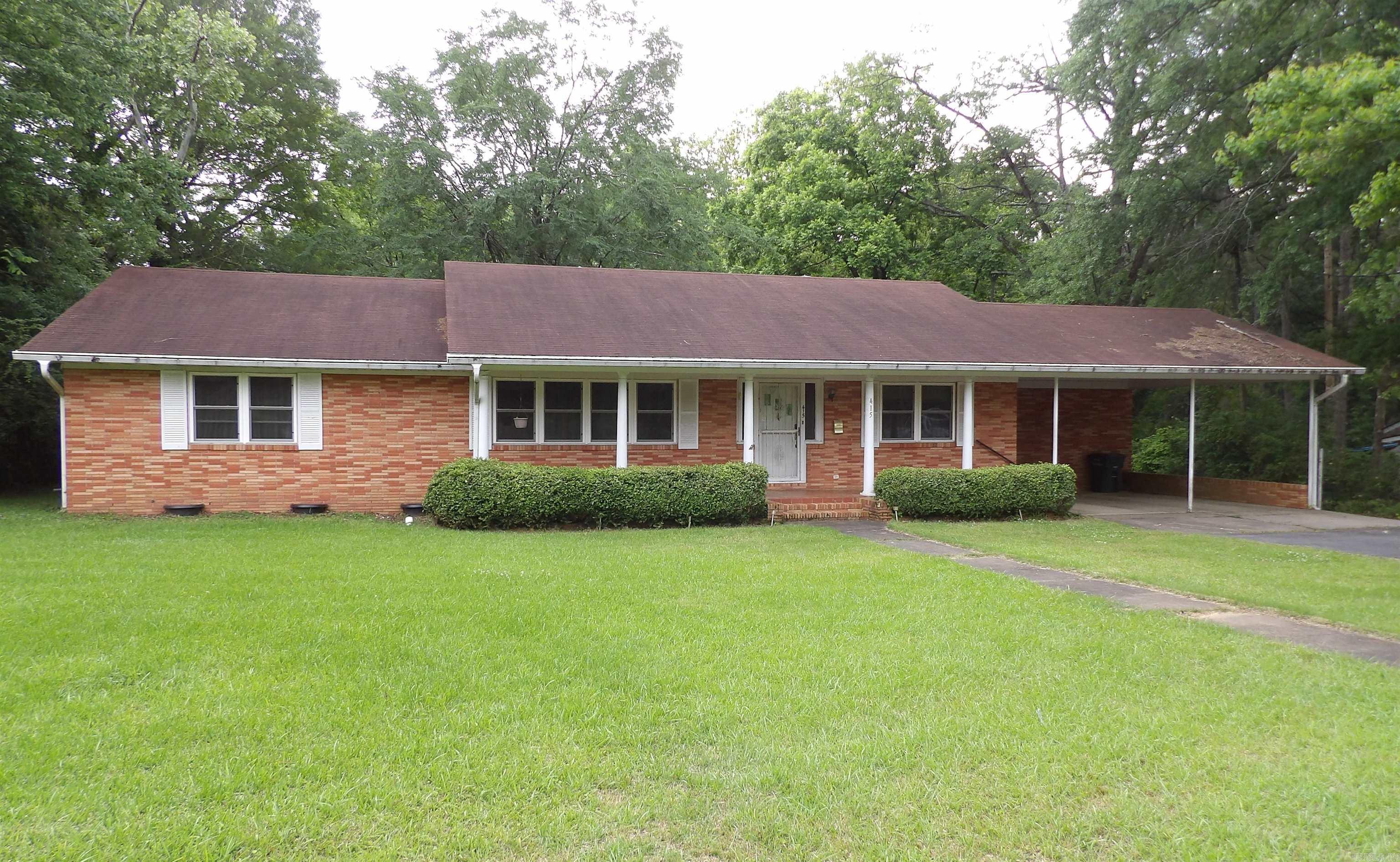 This charming home was built when homes were built by true craftsman! It offers a large living room with a formal dining room, four bedrooms and 3 bathrooms. It has a large sunroom on the back of the house and a bonus Mother-In-Law suite! The home has two completely separate kitchens. It sits in a very quiet neighborhood and is move in ready.
