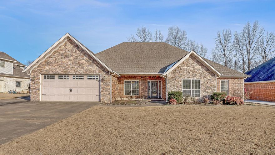 Looking for plenty of space? This home has it all! The large eat-in kitchen features ample cabinet storage, a central island with seating, and room for a dining table and a cozy den area with a fireplace. The open-concept living and dining area boasts tall ceilings and a second fireplace, perfect for gatherings. With 4 bedrooms and an upstairs bonus room, there's room for everyone! The bonus room, complete with a full bathroom, walk-in closet, and projector, could be used as a fifth bedroom or a theater room. The primary suite offers a tiled walk-in shower, jacuzzi tub, dual sinks, and abundant counter space with storage. One bedroom has its own private bathroom, while the other two share a hall bathroom. Outside, enjoy a fenced backyard and a covered patio, ideal for relaxing or entertaining. Located in a sought-after subdivision, this home is a must-see!