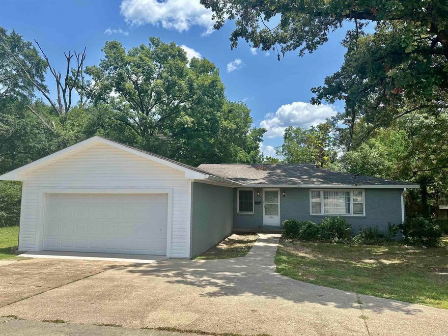 Older home that has been maintained.  New roof and new 2 car garage with circle drive.  3 large bedrooms and 1-1/2 bathrooms.  Cozy enclosed porch/sunroom.  Great space in the 24 x 24 shop and also a storage building in the fenced in backyard. Lots of character in this home. Living room/dining combo. Hardwood floors under carpet, galley style kitchen with small eat in area. Home is 1,784 square feet.  Interior pictures coming soon!