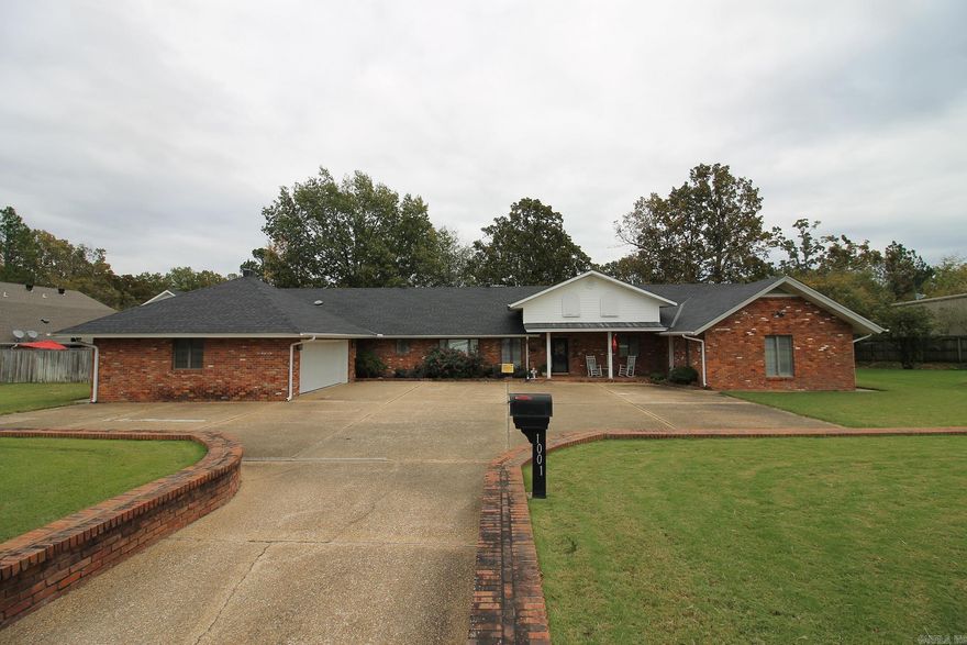 LOCATION! LOCATION! LOCAtiON!  This home used now as a single family dwelling has been zoned C-1 so it will be a wonderful place for an investor to consider a professional office space or a clinic.  While the spacious home has a brand new roof and HVAC unit the basement is ready to go for any kind of additional storage space or specific detail one might have in mind. The out-building once used as a pool house has utilities available. The huge front area of this structure could be converted for plenty of parking for any business. Obviously, when you see the location of this structure you will know it would be a prime place for a business