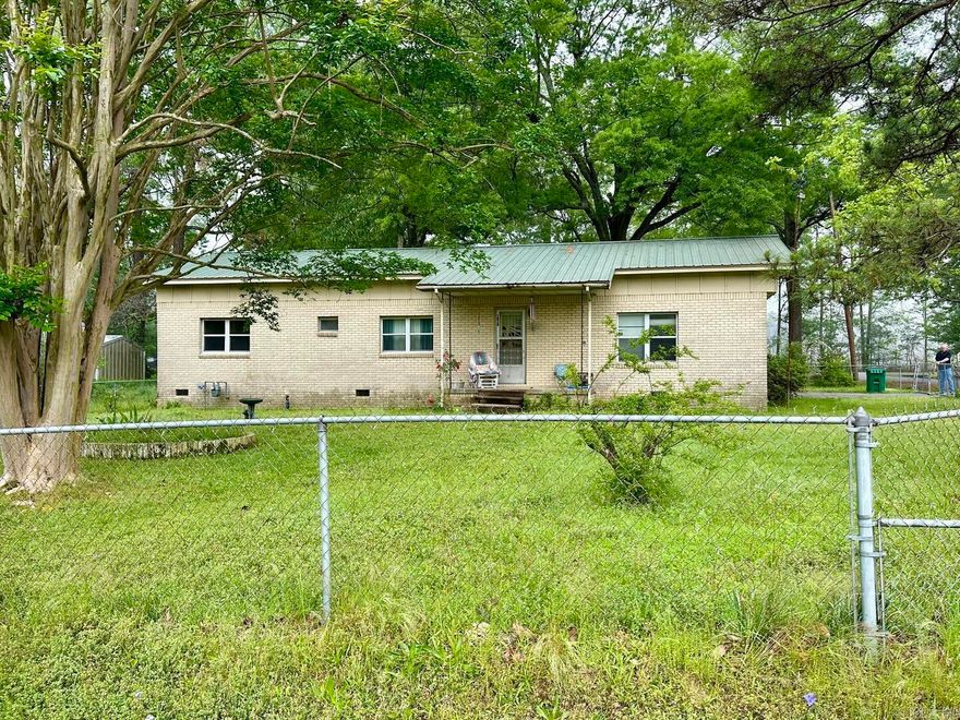 Investment Opportunity. White Hall School District. Corner Lot and Fully Fenced Yard. 3 Bedrooms and Two Full Baths. Modular Home, Fully Bricked Exterior with Metal Roof. One Car Carport. Backyard Storage Building.