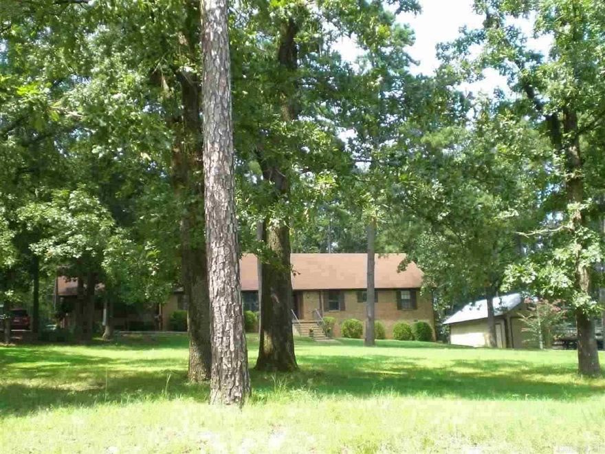 Country Ranch - Custom built one story brick on 2 acres in area of attractive homes only 3 miles from Pinnacle Mtn. Notable features included tile counter kitchen w/breakfast bar; master suite has 2 walk in closets; 2 car side entry garage w/storage room; Separate 18X30 workshop - garage w/ 9' wide door, great for boat or extra equipment; 10X15 stand-up under house storage; and extensive concrete circular driveway. Less than 6 miles from Hwy 10. See recent improvements per seller in agent remarks.