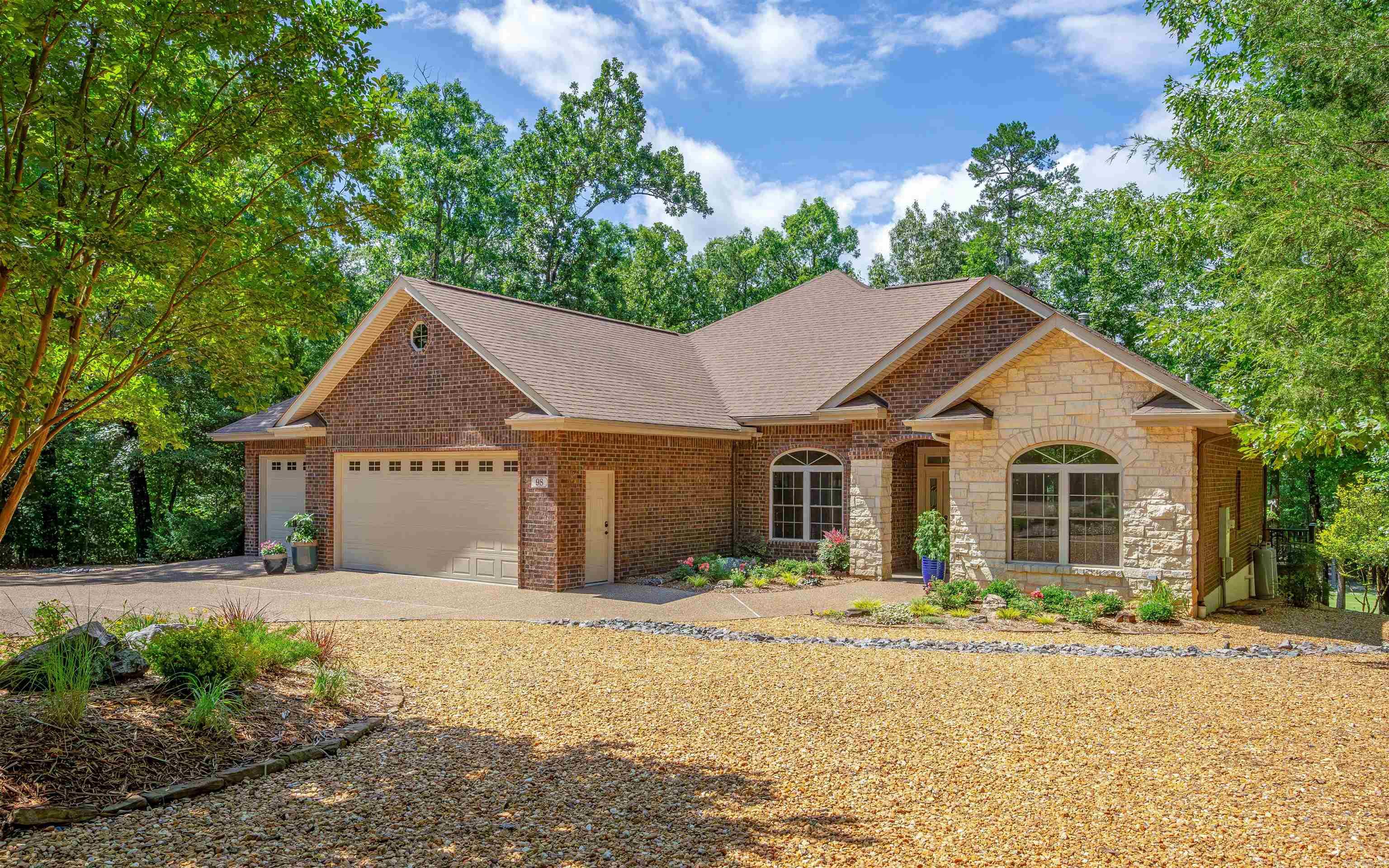 Beautiful Golf Course Living on the 17th Hole of Magellan – Par 3 Perfection! Welcome to this impeccably maintained, well-appointed home built by Ed Falls. With timeless curb appeal and blend of brick and stone exterior, this property is a true standout in a picturesque setting. Step inside to soaring 10-foot ceilings and a thoughtfully designed open floor plan that feels spacious and inviting. Every detail speaks of quality. The kitchen will impress the most discerning cook, featuring premium LG cooktop, oven and microwave, along with a whisper-quiet Bosch dishwasher. Enjoy peace of mind with a top-of-the-line 2023 Trane HVAC system featuring variable speed technology, gutter guards for easy maintenance, and a fenced backyard—ideal for pets. Professional landscaping in both the front and back creates a tranquil outdoor retreat, framed by amazing golf course views! A spacious 3-car garage provides ample room for vehicles, storage, and hobbies, while the home's overall condition reflects true pride of ownership both inside and out. If you've been dreaming of golf course living, this is your hole-in-one opportunity. See Agent Remarks and Associated Documents for owner updates.