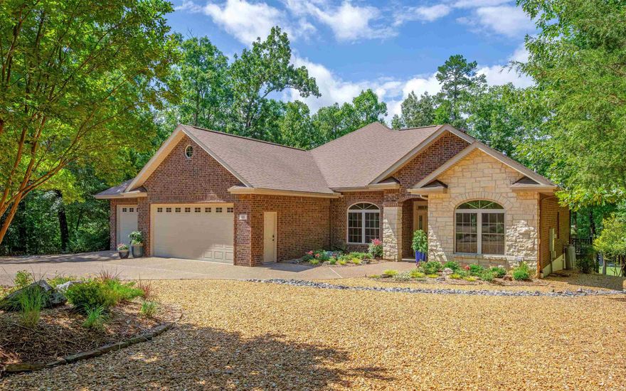 Beautiful Golf Course Living on the 17th Hole of Magellan – Par 3 Perfection! Welcome to this impeccably maintained, well-appointed home built by Ed Falls.  With timeless curb appeal and blend of brick and stone exterior, this property is a true standout in a picturesque setting. Step inside to soaring 10-foot ceilings and a thoughtfully designed open floor plan that feels spacious and inviting. Every detail speaks of quality.  The kitchen will impress the most discerning cook, featuring premium LG cooktop, oven and microwave, along with a whisper-quiet Bosch dishwasher.  Enjoy peace of mind with a top-of-the-line 2023 Trane HVAC system featuring variable speed technology, gutter guards for easy maintenance, and a fenced backyard—ideal for pets. Professional landscaping in both the front and back creates a tranquil outdoor retreat, framed by amazing golf course views!  A spacious 3-car garage provides ample room for vehicles, storage, and hobbies, while the home's overall condition reflects true pride of ownership both inside and out.  If you've been dreaming of golf course living, this is your hole-in-one opportunity.  See Agent Remarks and Associated Documents for owner updates.