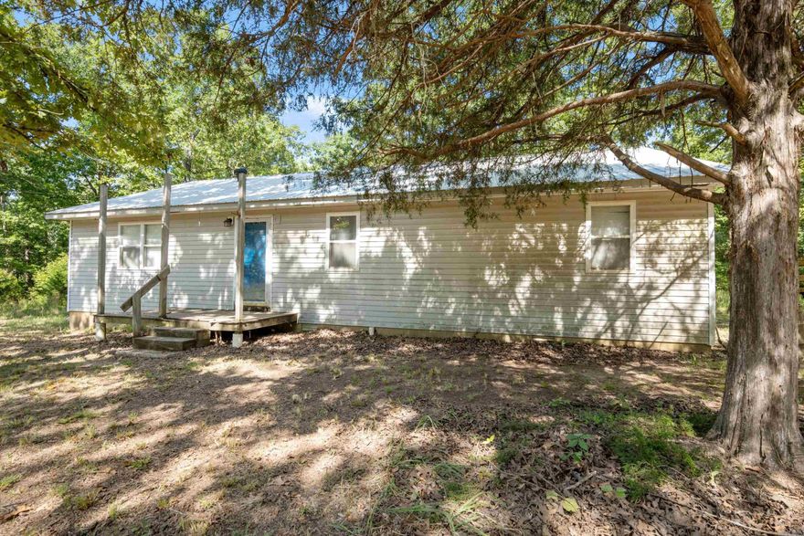 Tucked away in the Ozark Mountain foothills, in the solitude of the forest and trees lies this perfect get away. This property has a 1500 square foot 3 bedroom, 2 bath home that’s ready to have some attention and detail. Built in 1994/95,’ the home has septic and a well that draws water straight from the foot hill area. As well as a modern home, this property is 39.74 acres of mature timber that plays host to ALL of Arkansan wild life such as whitetailed deer, Eastern Wild Turkey, coyote and other small game. Located just 4 miles from the city of Ravenden, 20 miles from Hardy, 45 minutes to Jonesboro, this property puts you  in comfort of country living, without the hustle and bustle of everyday traffic, or this could provide that perfect hunting spot that you and your family have always dreamed of having.