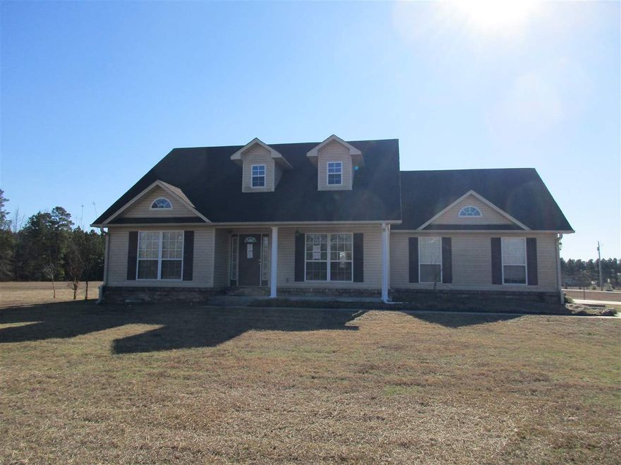 Great home on a corner lot of 3.43 acres.   This home has a split floor plan, dining room, vaulted ceilings, hardwood floors, and stainless steel appliances.  Nice back porch.  Double garage.  Call today for your personal tour!  **Agents See Remarks**