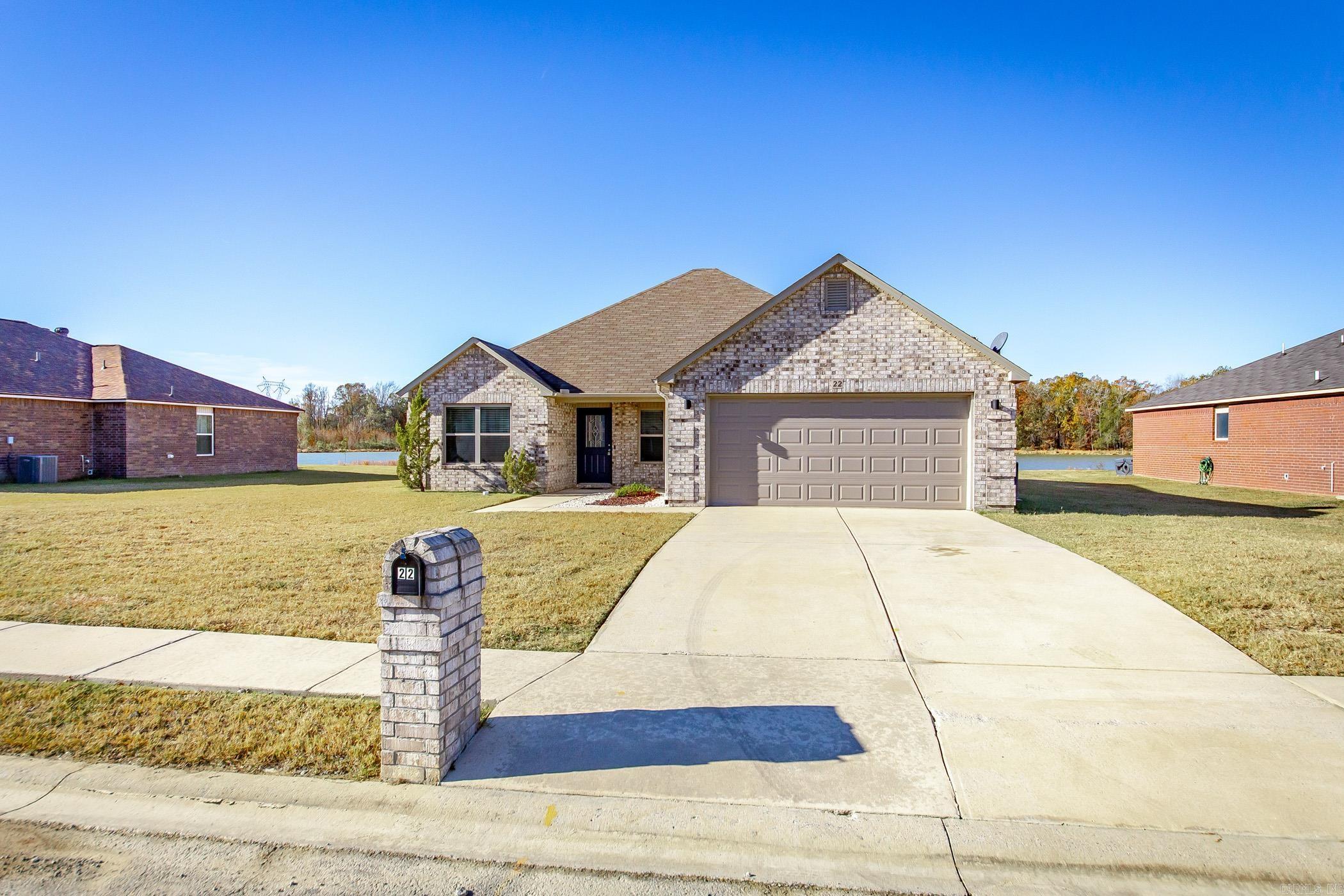Gorgeous waterfront home located close to shopping, interstate and local schools. Open floor plan, large kitchen/dining combo with an island. Pantry and separate laundry room. Good size rooms, lots of storage. Master is separate from other bedrooms. Covered patio for an added bonus. Neutral paint throughout. Two car garage and floored attic space. Don't miss out on this fabulous home. Seller is offering a $3,000.00 flooring allowance.