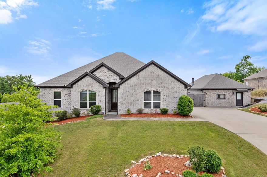 Discover the peace and privacy of Lochridge Estates, a gated subdivision with Lake Florence just two blocks away. This well-kept home offers stunning 10-mile views and unforgettable sunsets from a 525 sq ft two-level deck. Owned for the past 8.5 years by a senior bachelor, this is truly a “low mileage” home. The 2,050 sq ft main house features 3 bedrooms, 2 full baths, a jetted tub, walk-in closet, tray ceilings in two bedrooms, and a vaulted ceiling in the third. The open kitchen and den create a spacious, welcoming feel. New roof and gutters were installed in 2024, plus new garage tile flooring in 2025. The 850 sq ft guest house, completed in 2019, is perfect for guests, a home office, in-law quarters, or a man cave. It includes a 4th bedroom, bathroom, pantry, bar, and wood-burning fireplace. A whole-house Generac generator powers both homes. Situated on a half-acre corner lot with one of the best views in Lochridge, you’ll enjoy a quiet country feel while being just 7-8 minutes from The Promenade, Costco, and Kroger. The home was professionally inspected on 4/22/26, with only a few minor items being addressed. Energy-efficient living keeps total annual utilities under $3,000!
