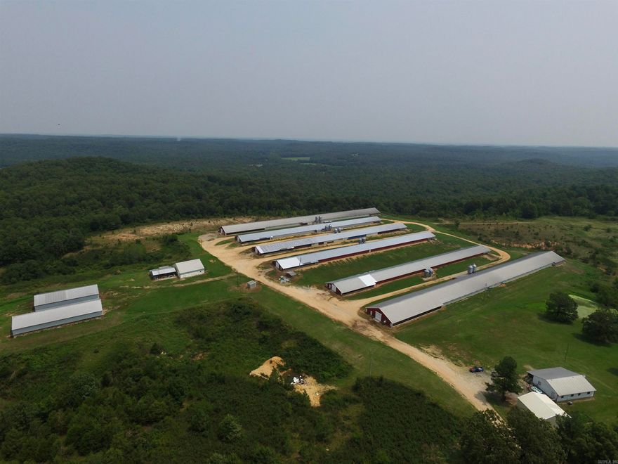 Fully operational Poultry Farm w/Active Contracts on Approx 125 Acres and Meets Compliances for George's and Ozark Mountain Poultry Standards.  Six (6) Active Updated Poultry Grow Houses, Two (2) Litter Barns, One (1) Water Storage Room Foam Insulated and Heated, and Onsite Manager Dwelling / Home.  Well Water and City Water Onsite.  Turn Key Operation ready to new owner.  See Agent Remarks.