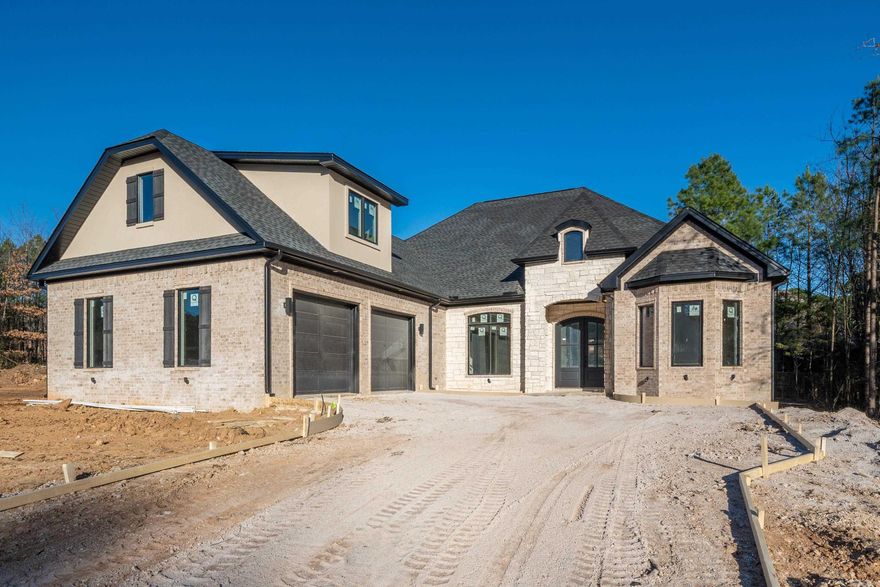 Located in gated Arlington Park Subdivision this brand new 4 Bedroom 3 Bath home is sure to please. It has 3295 sq. ft. of living space, and has an oversized 2 car garage. All of the bedrooms are located on the main floor and there is a large bonus room upstairs. The features in this home are endless, including a rock fireplace, vaulted ceilings, upgraded fixtures, built-ins, lots of storage, tankless water heater, foam insulation, and much more! You will love the back porch overlooking the large back yard. Perfect for entertaining! Located in Lakeside School District! Call today for a showing!