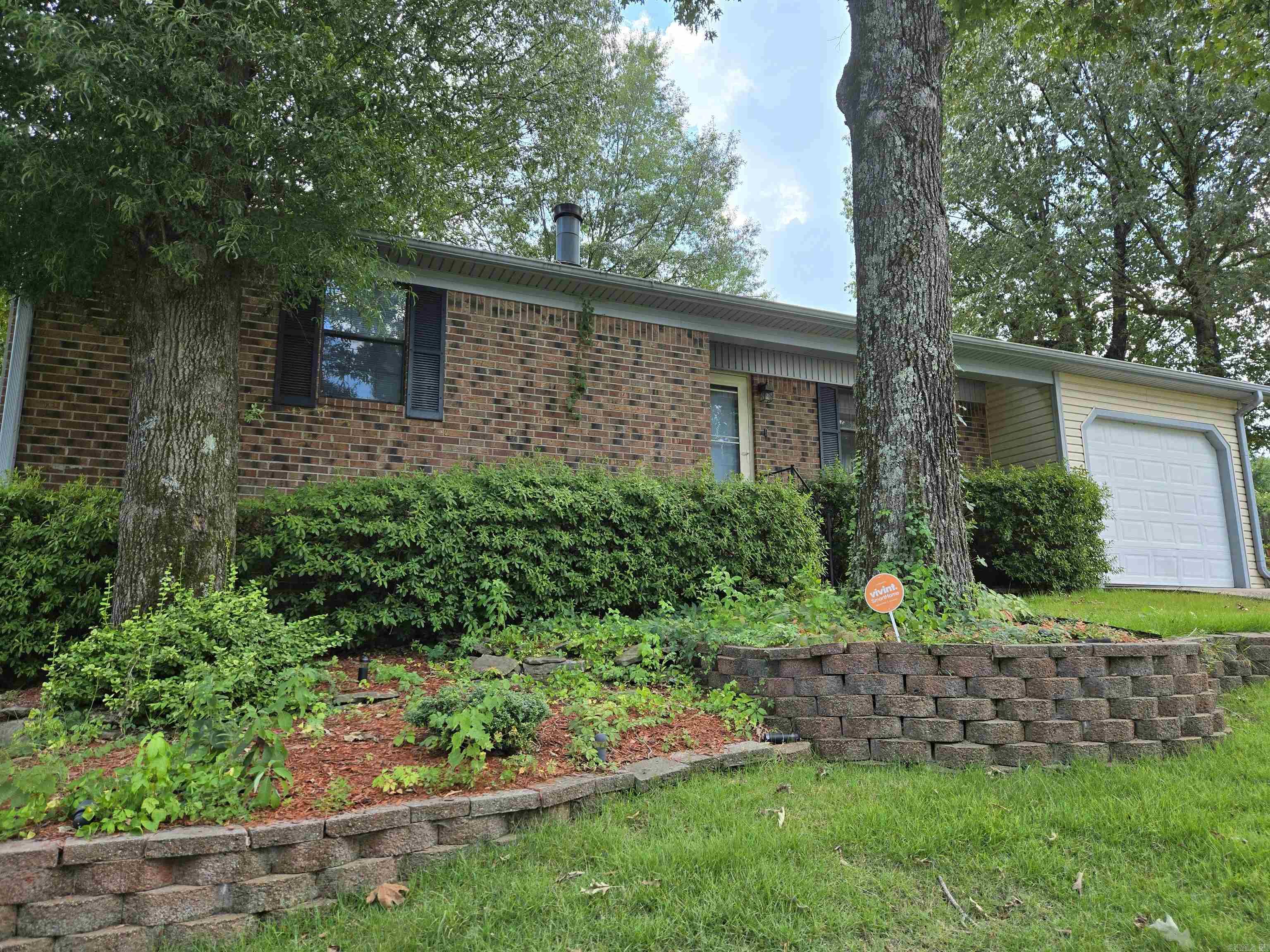 Nestled on a peaceful dead-end street, this charming 3-bedroom, 2-bath home offers comfort, convenience, and exceptional value. Sitting on a generous 0.24-acre lot, the property features a professionally installed irrigation system to keep the lush landscaping thriving year-round. Step inside and enjoy the warmth of a fully furnished interiorāall furniture and appliances convey at no cost, making this move-in ready opportunity even more inviting. The thoughtful layout provides spacious living areas, cozy bedrooms, and an open kitchen perfect for entertaining or everyday living. Whether you're a first-time buyer, downsizing, or looking for a turnkey investment, this home checks all the boxes. Enjoy the serenity of your surroundings while still being minutes from everything Paragould has to offer. Newer 10 X 12 outside storage building.