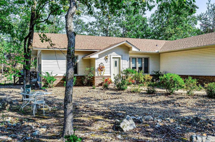 Welcome to this well-maintained 2-bedroom, 2-bath home nestled on a quiet cul-de-sac just minutes from the Coronado Fitness and Tennis Centers and beautiful Lake Coronado. This fully furnished home features a spacious open floor plan with a desirable split-bedroom layout, perfect for comfort and privacy.  Enjoy peaceful views of the backyard from the inviting Arkansas room—an ideal spot for morning coffee or unwinding at the end of the day. The light-filled living and dining areas flow seamlessly into the kitchen, creating a great space for everyday living and entertaining.  Additional highlights include a 2-car garage, low-maintenance landscaping, and single-level living for convenience. Whether you're looking for a full-time residence or a turnkey getaway, this property is ready for its new owner to move right in and start enjoying the Hot Springs Village lifestyle!  Agents please review showing and agent remarks.