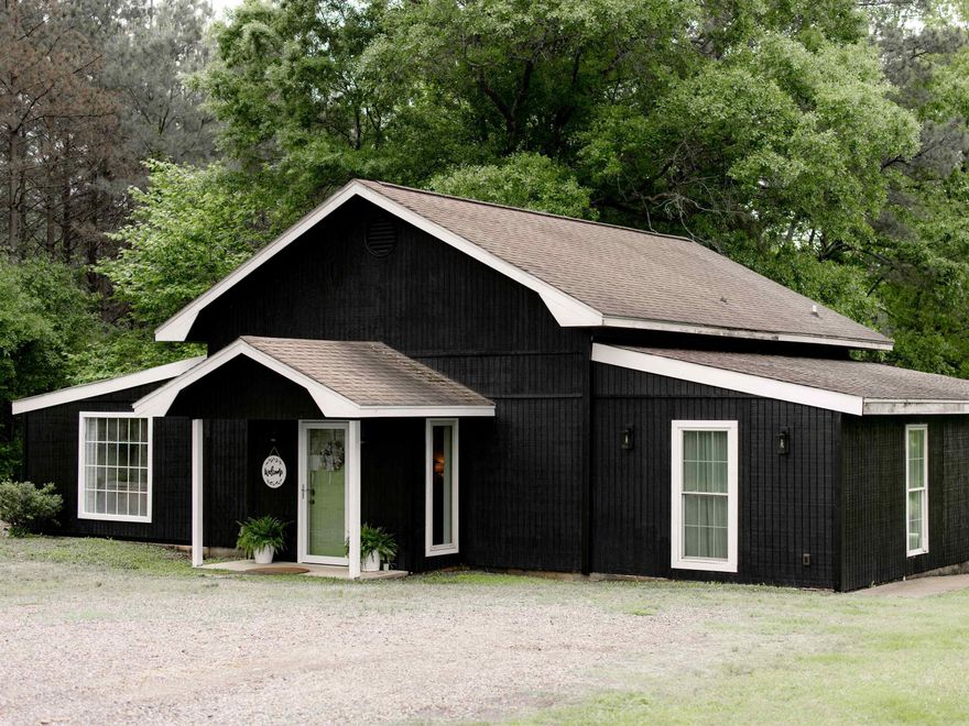 This beautiful property is located at the end of a quiet tree-lined drive near Lake DeGray.  It features an open concept living/dining/kitchen area, 3 bedrooms, 2 bathrooms, laundry room and beautiful large back porch overlooking the back yard. Plenty of space to park the lake toys for the summer. This property could function as an ARBNB or as full time residence. Schedule a showing today!