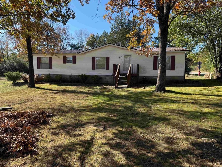 Spacious 3 bedroom & 2 bath double wide on a perm foundation. The home is 1680 sq ft and sits on a large corner lot with easy access to everything Heber Springs has to offer. The bedrooms are all very large. The living, dining and kitchen are open and provide plenty of room for eating and entertaining. Two storage buildings plus extra storage next to the double car carport. Screened in back porch for extra enjoyable space. The appliances all stay. Seller bonus of $7,500 towards new flooring and paint or closing cost for the buyer. Schedule a showing ASAP!