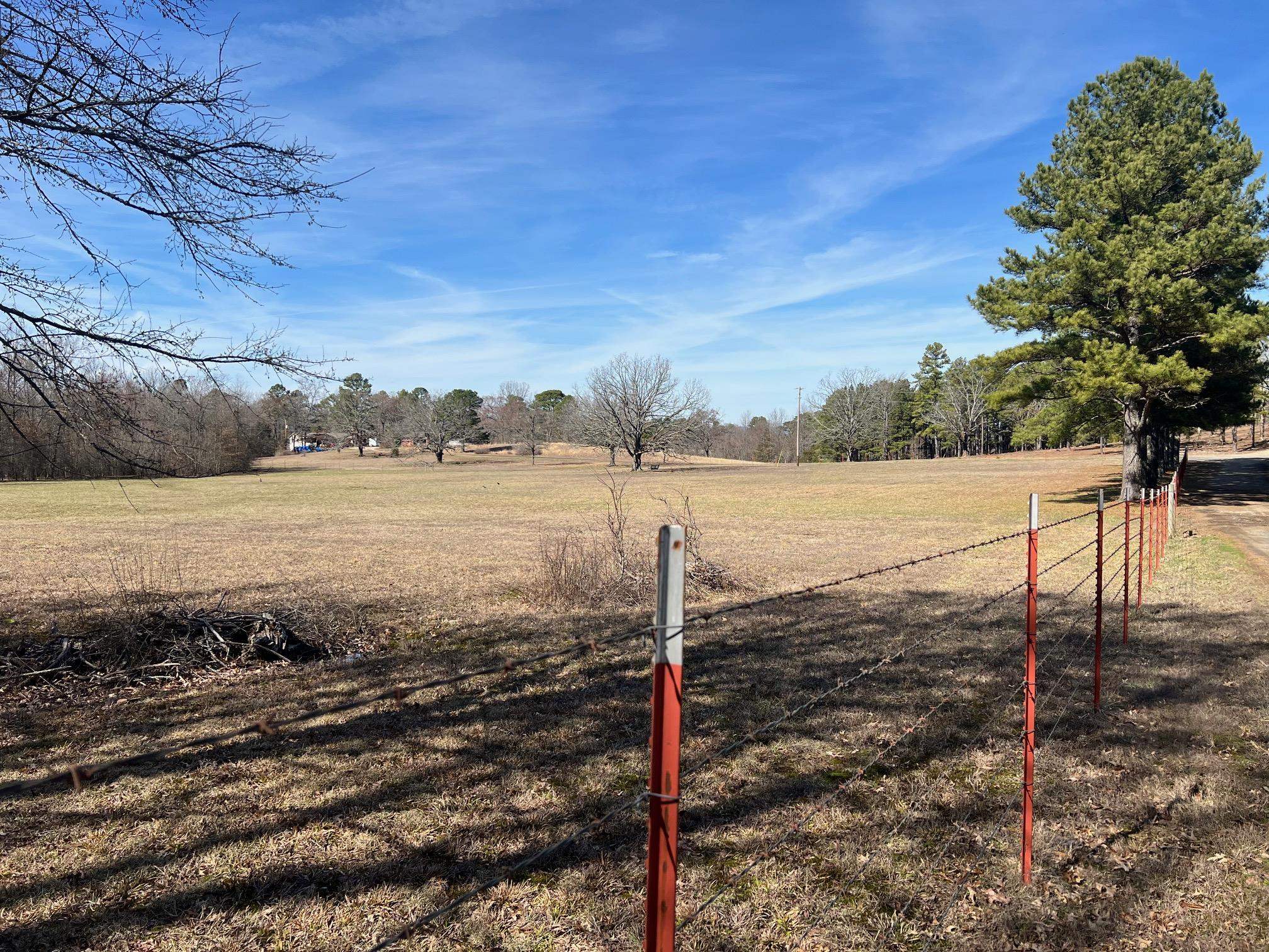 Country living at it's best with lake access! Property has been surveyed. Build your forever home nestled under large oak trees not far from town.