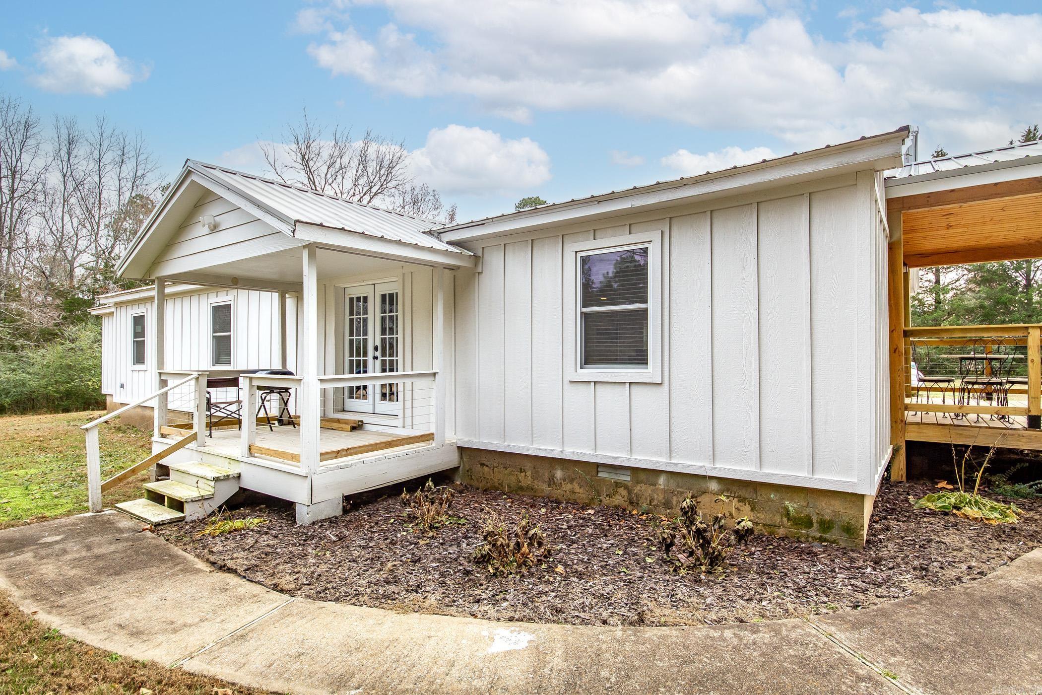 You will fall in love with this beautiful home nestled in the trees just minutes from Greers Ferry Lake! Enjoy a very quiet and private setting with lots of wildlife and plenty of room for outdoor entertaining. This charming 3 Bed/2 bath has it all if you're looking for tranquility and relaxation! Completely remodeled and fully furnished with almost an acre of land and Old 25 Boat Lauch less than 2.5 miles away, this one is sure to go fast!