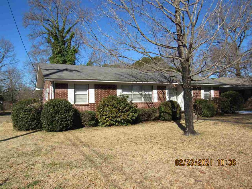 Well maintained 3 bedroom home, combination of laminate & wood flooring, spacious bedrooms, all kitchen appliances including refrigerator, separate washer & dryer hook-ups, 2 inch blinds throughout, corner lot with side entry carport, walk to UCA or CRMC. No Pets.