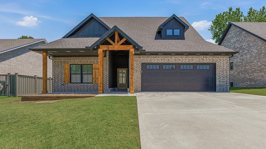 Built in 2024, this beautifully crafted home in The Farmhouses at Summit Ridge combines timeless design with modern comfort in one of Paragould’s most sought-after subdivisions. A grand entry welcomes you into bright, open living spaces accented by soaring 10-foot ceilings throughout the main areas and primary suite, creating an airy and inviting atmosphere. The open-concept layout is designed for effortless living and entertaining, connecting the spacious living room, dining area, and chef-inspired kitchen. Featuring an oversized island, upscale finishes, and generous storage, the kitchen serves as the heart of the home. The luxurious primary suite offers a relaxing escape with a spa-like bath complete with a large tiled shower, separate soaking tub, and an oversized walk-in closet with direct access to the laundry room for everyday convenience. Thoughtfully designed with style and functionality throughout, this home offers the perfect blend of modern luxury and practical living.