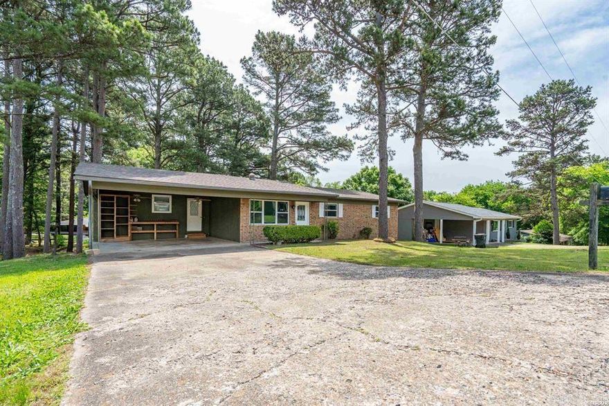 This spacious 3-bedroom home has been revitalized with brand-new flooring and fresh paint throughout, creating a bright and airy atmosphere that is ready for immediate move-in.  The heart of the home features a functional layout designed for comfort with a spacious living area. From the large kitchen and dining space, step out onto the deck—the perfect spot for morning coffee or summer BBQs while overlooking your large backyard. The primary bedroom is complete with its own bathroom. Two additional bedrooms on the main level offer plenty of natural light and easy access to the main living areas. The lower level features two bonus rooms, ideal for a home office, guest quarters, or fitness area with a convenient half-bathroom and access to the backyard.