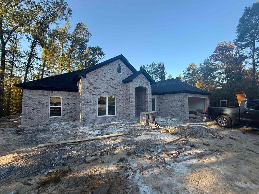 Step inside this beautiful new 4 bed, 2.5 bath home and fall in love with its thoughtful design and modern charm. From the moment you walk through the front door, youāre greeted by a bright, open living space centered around a striking electric fireplace. The kitchen is a true showpiece, featuring sleek quartz countertops, custom cabinetry, stainless steel appliances, and a generous pantry for added convenience. The open floor plan makes everyday living and entertaining effortless, while luxury vinyl plank flooring flows throughout the main areas, carpet in bedrooms, complemented by tile in the baths and laundry. The spacious primary suite offers a private retreat with a walk-in closet and a beautifully designed ensuite complete with dual sinks and a tiled shower. Step outside to enjoy the level backyard and covered patio ā ideal for morning coffee or evening gatherings. Conveniently located near shopping, dining, and major travel routes, this beautiful home truly has it all. Quality finishes, timeless style, and a comfortable layout come together perfectly in this new construction home ā ready for you to make it your own.